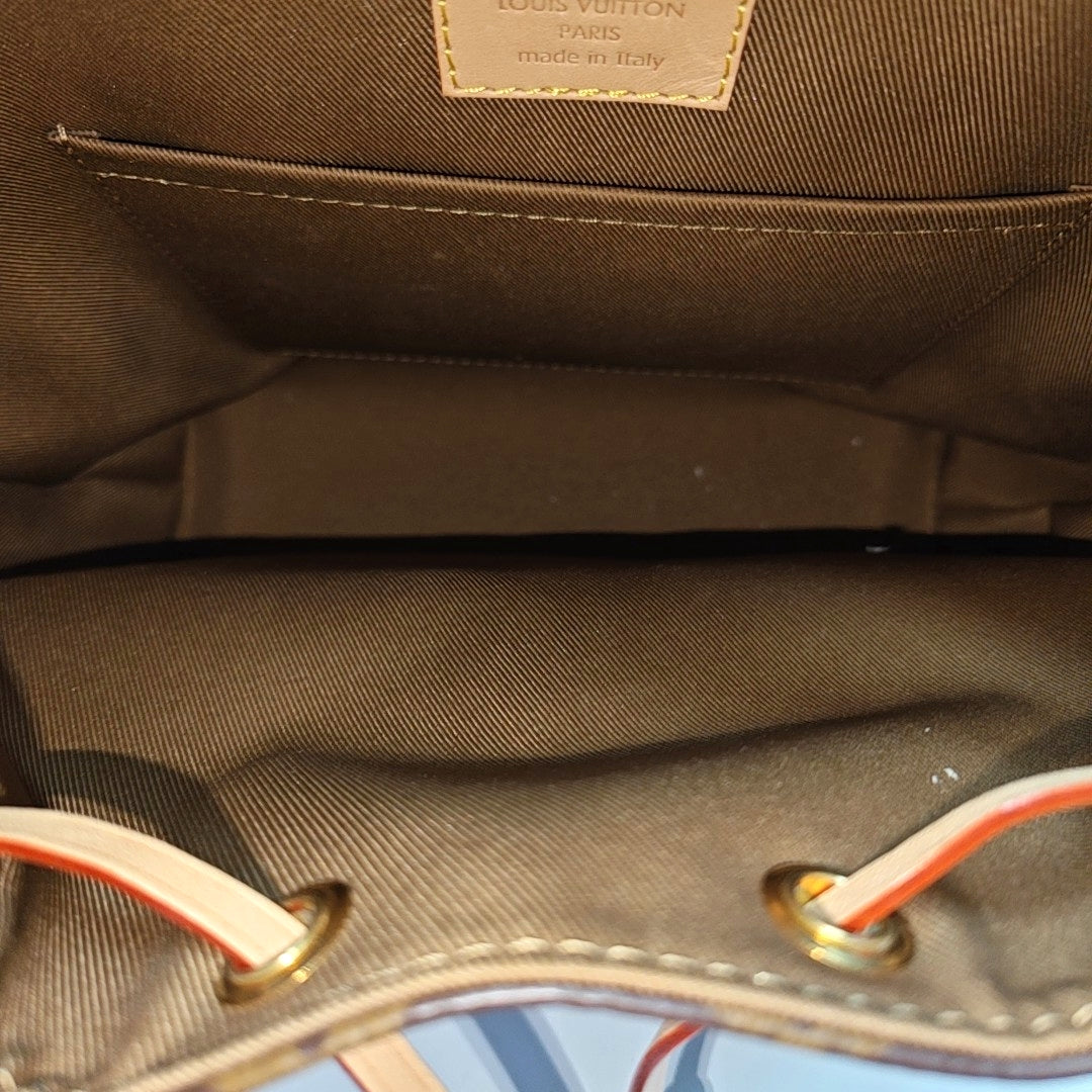 EXCURSION PM Monogram Coated Canvas Brown