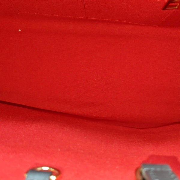 ONTHEGO MM Monogram Coated Canvas Brown