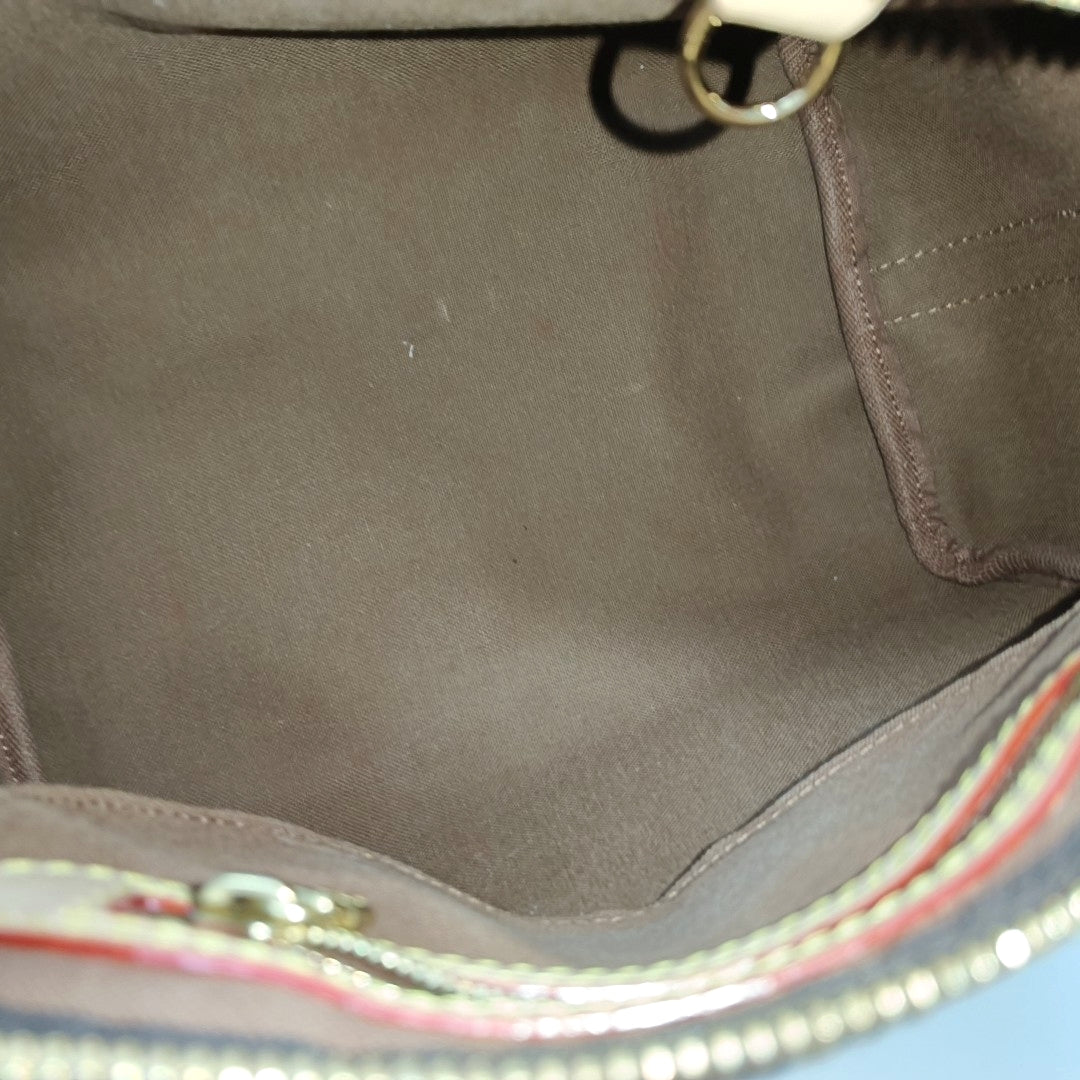 SPEEDY 25 Monogram Coated Canvas Brown