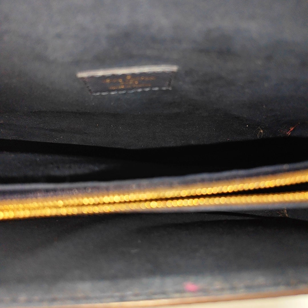 VICTOIRE Monogram Coated Canvas Brown