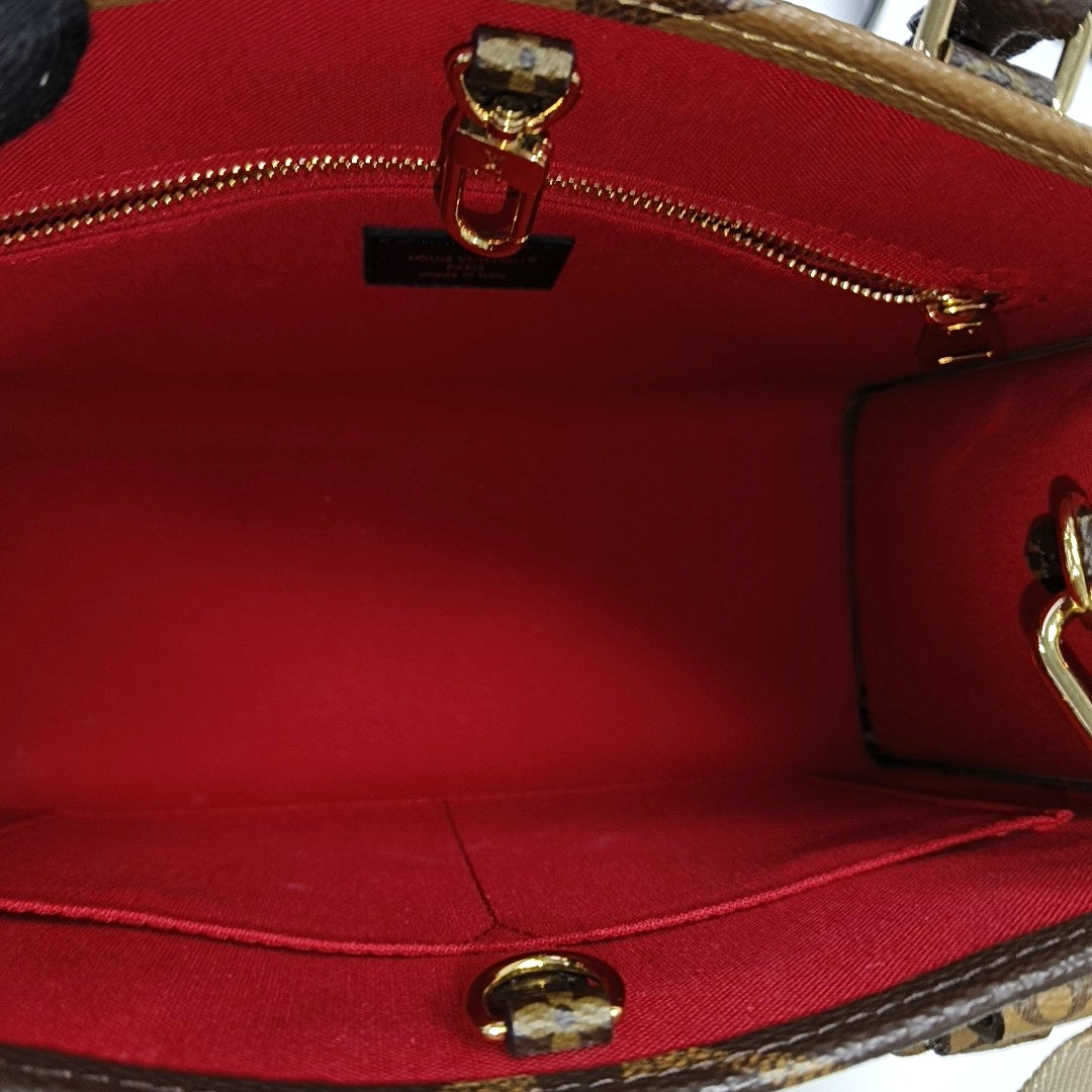 ONTHEGO PM Monogram Coated Canvas Brown