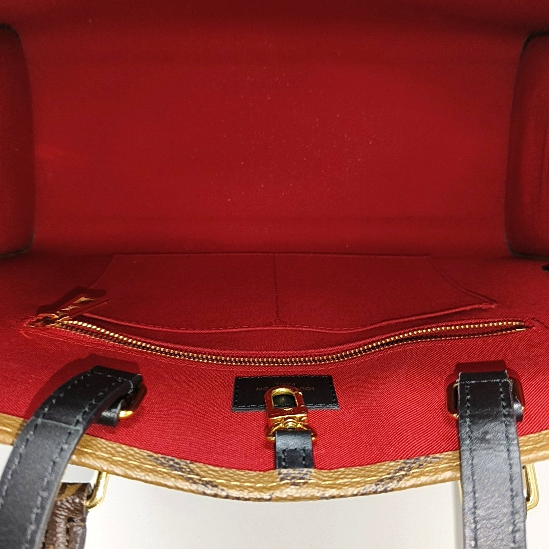 ONTHEGO MM Monogram Coated Canvas Brown