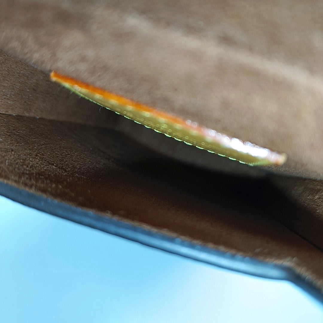 Monogram Coated Canvas Brown