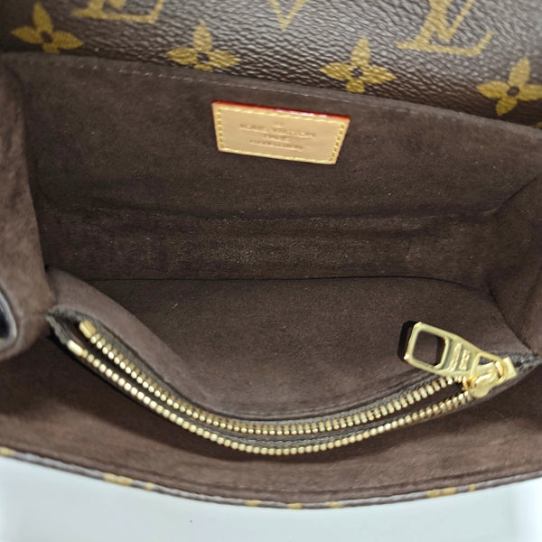 MÉTIS EAST WEST Monogram Coated Canvas Brown