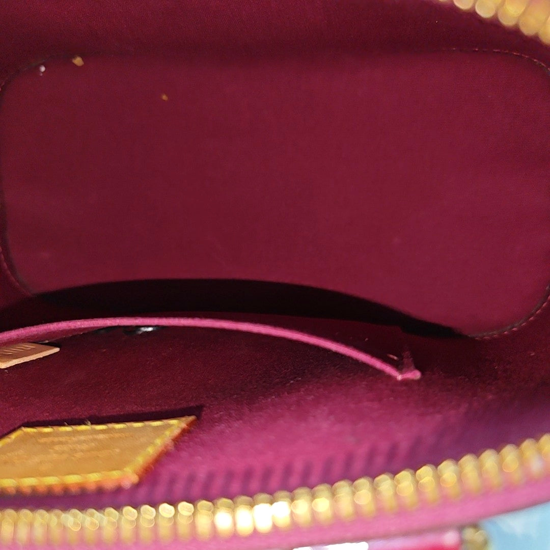 Authenticated pre-owned  ALMA BB Monogram Patent Leather Burgundy - Shoulder Bag at Looply