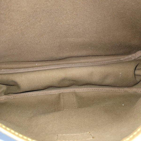 SAUMUR 35 Monogram Coated Canvas Brown