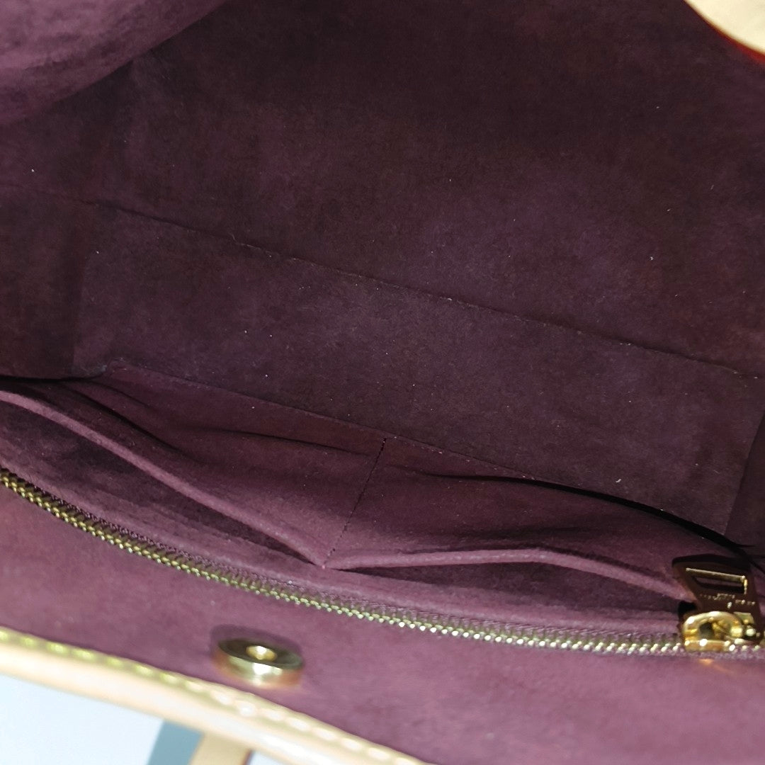 CARRYALL PM Monogram Coated Canvas Brown
