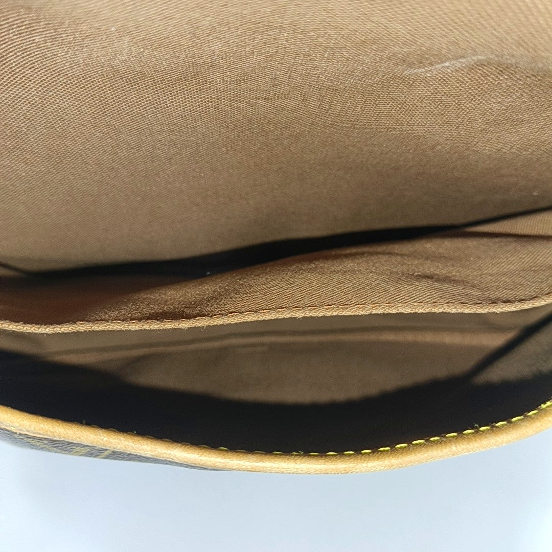 SAUMUR Monogram Coated Canvas Brown