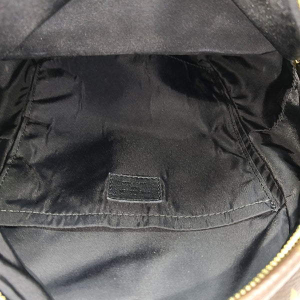 Authenticated pre-owned  PALM SPRINGS PM Monogram Coated Canvas Brown - Backpack at Looply