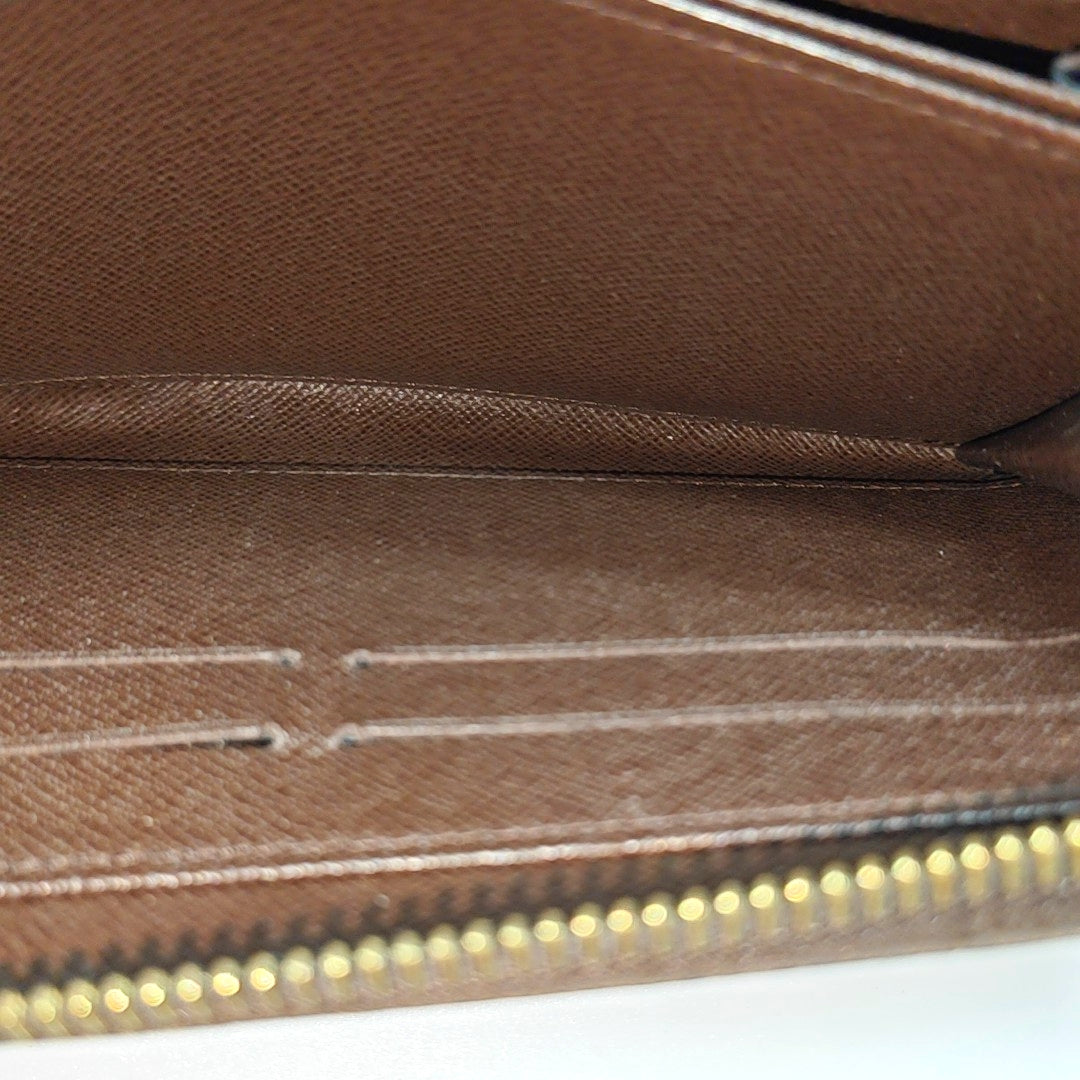 ZIPPY Damier Ebene Coated Canvas Brown Wallet