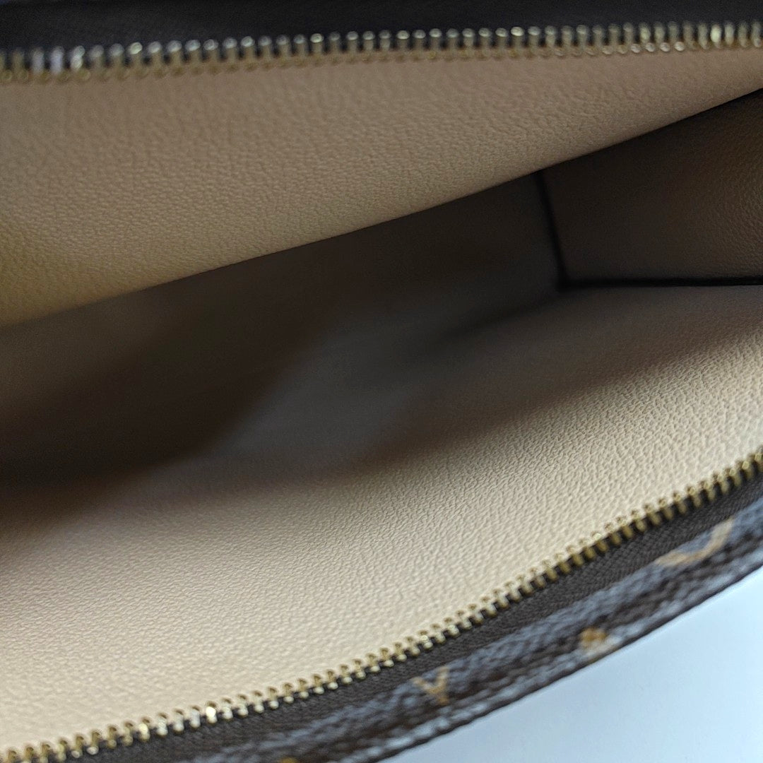 TOILET POCKET 26 Monogram Coated Canvas Brown