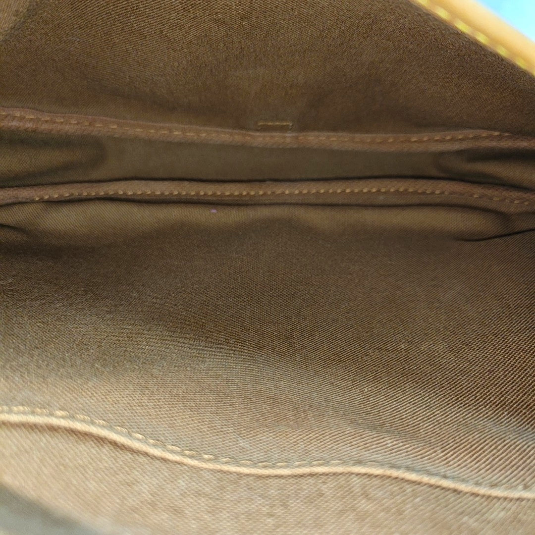 SAUMUR 30 Monogram Coated Canvas Brown