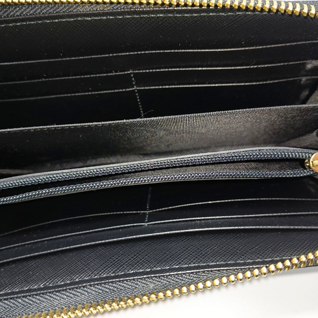 Authenticated pre-owned  Gancini Calfskin Black Wallet - Wallet at Looply