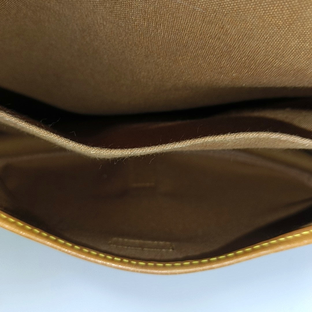 SAUMUR Monogram Coated Canvas Brown