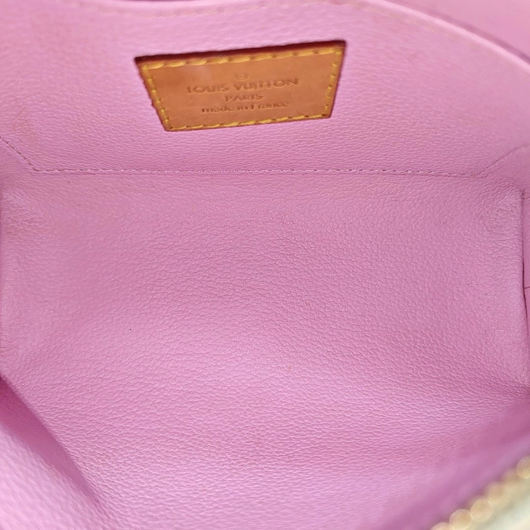 LV × TM COSMETIC PM Monogram Coated Canvas White