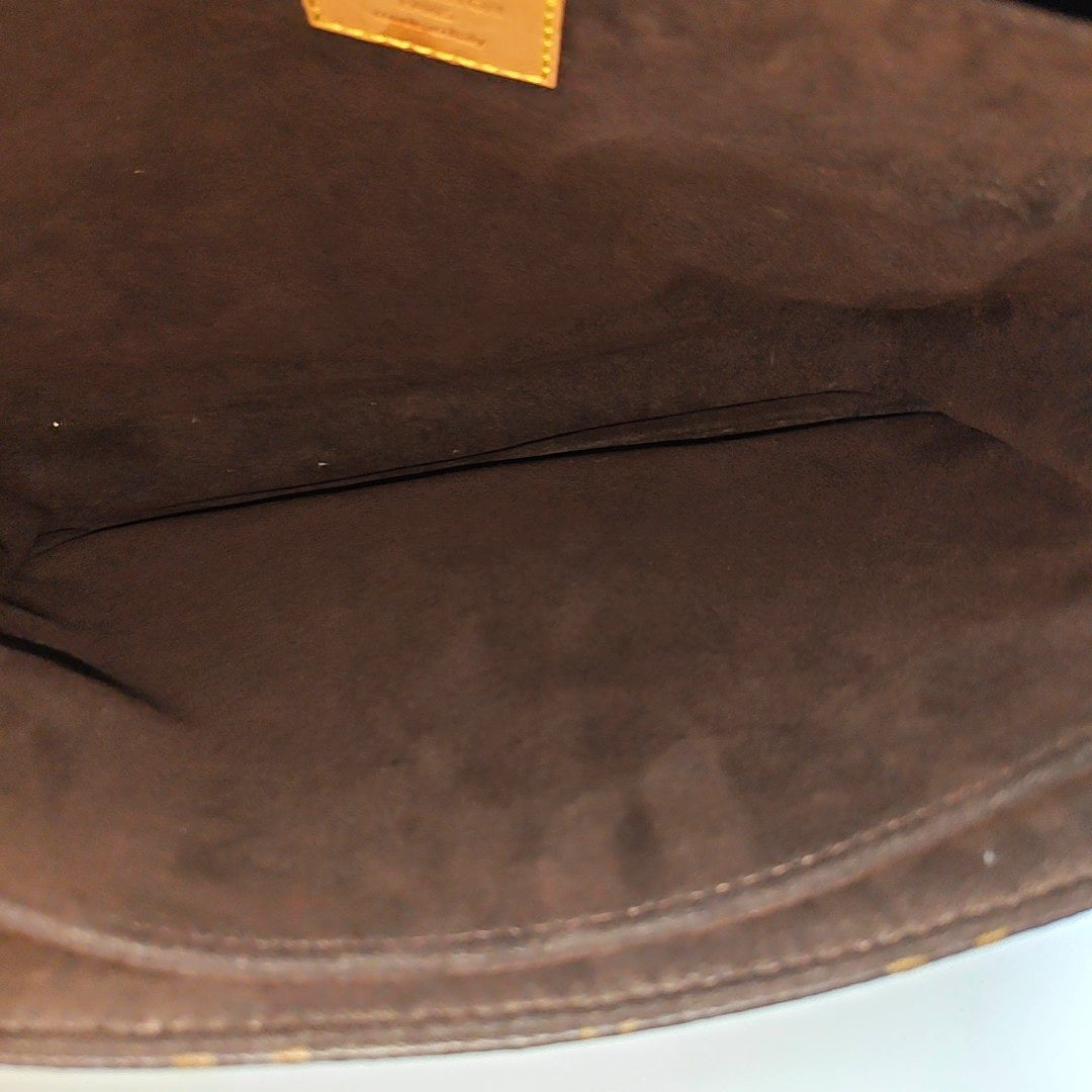 MÉTIS MM Monogram Coated Canvas Brown