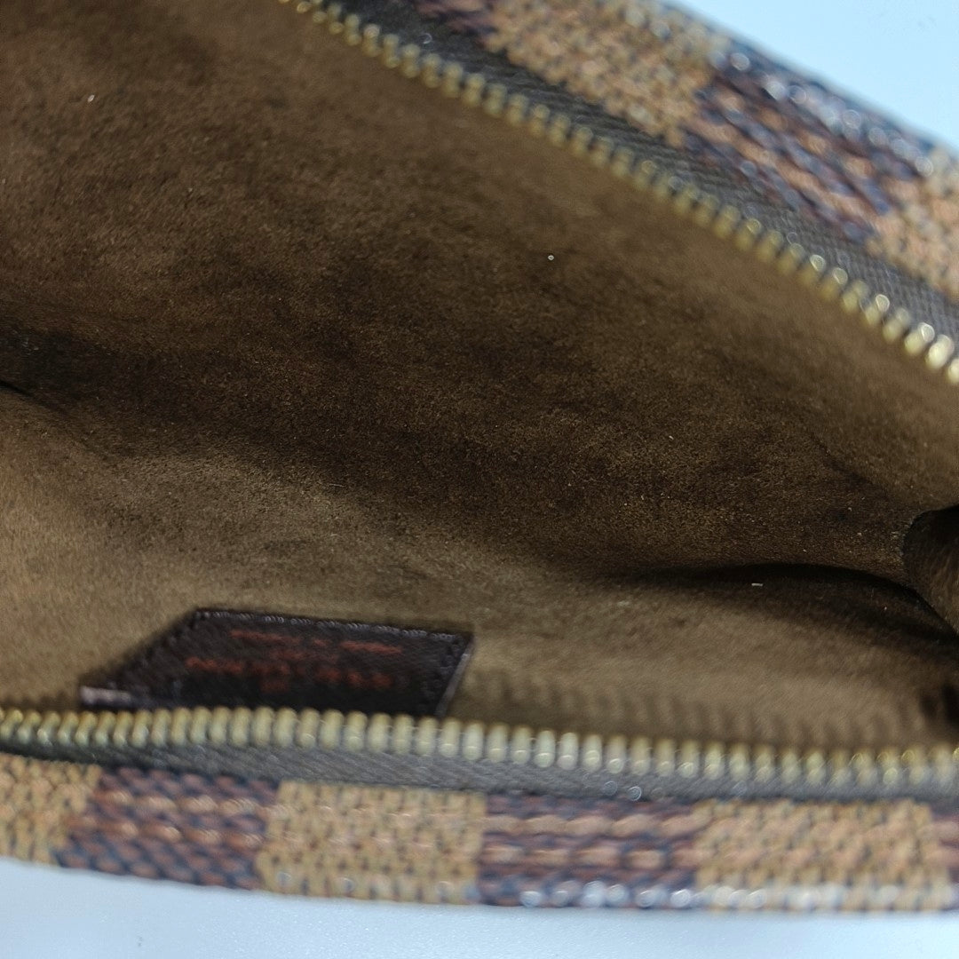 Authenticated pre-owned  BUCKET Damier Ebene Coated Canvas Brown - Clutch at Looply