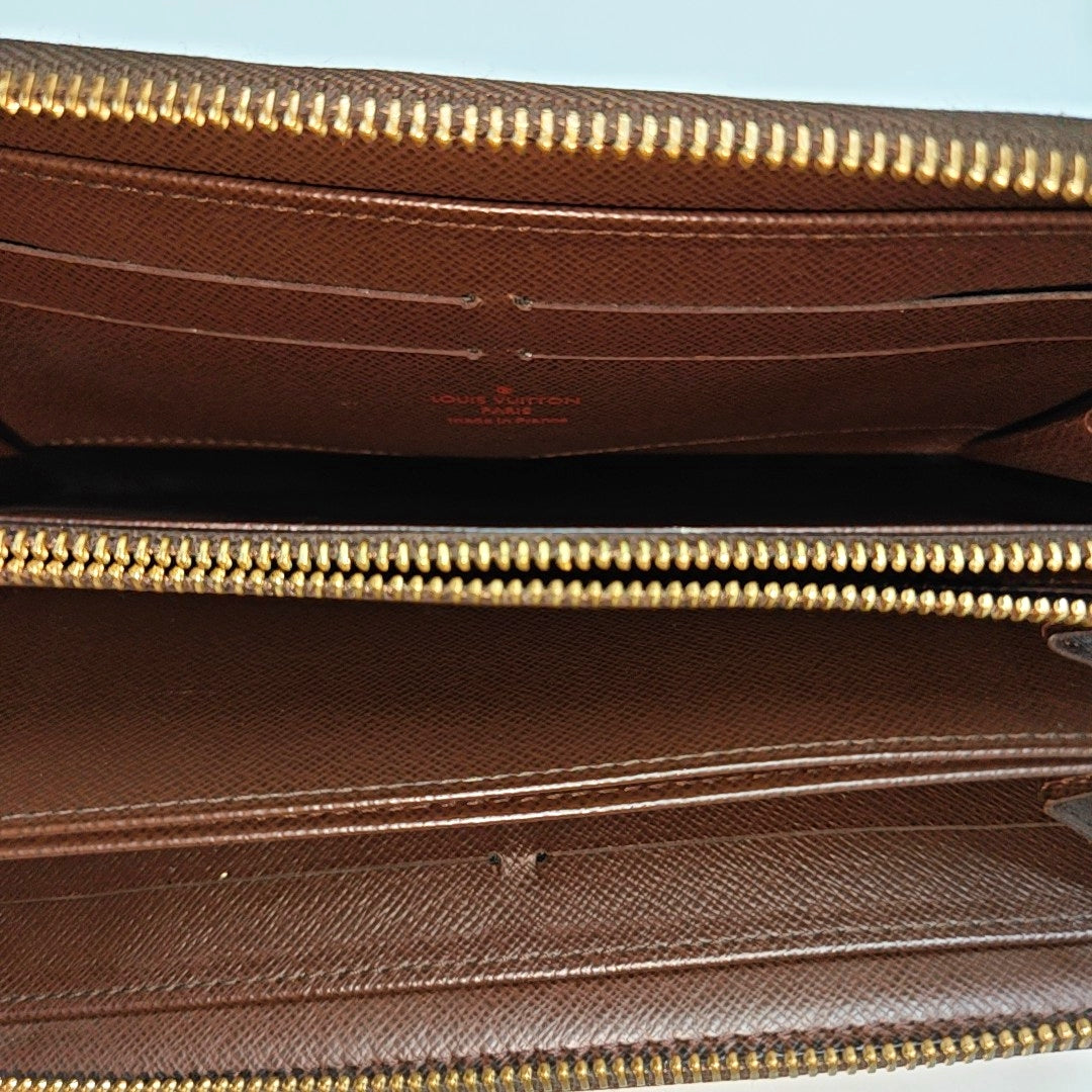 ZIPPY Damier Ebene Coated Canvas Brown Wallet
