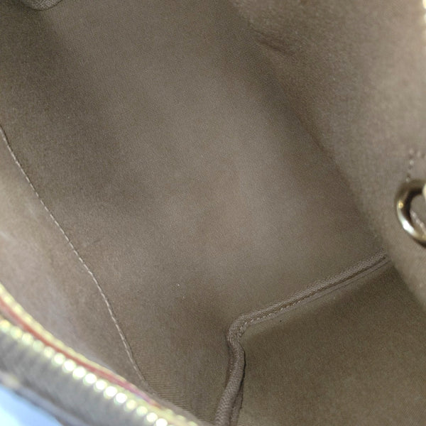SPEEDY 25 Monogram Coated Canvas Brown