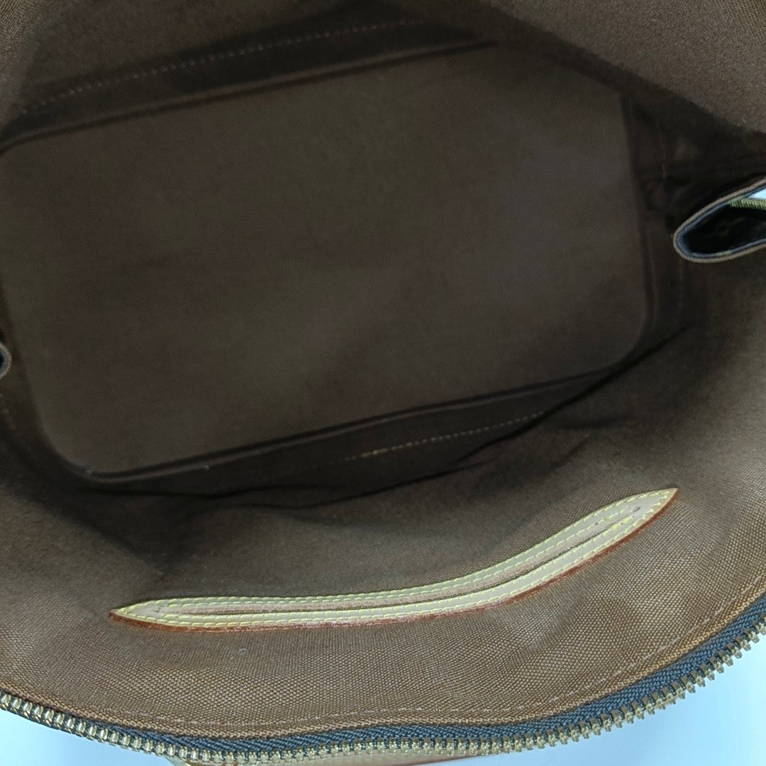 ALMA PM Monogram Coated Canvas Brown
