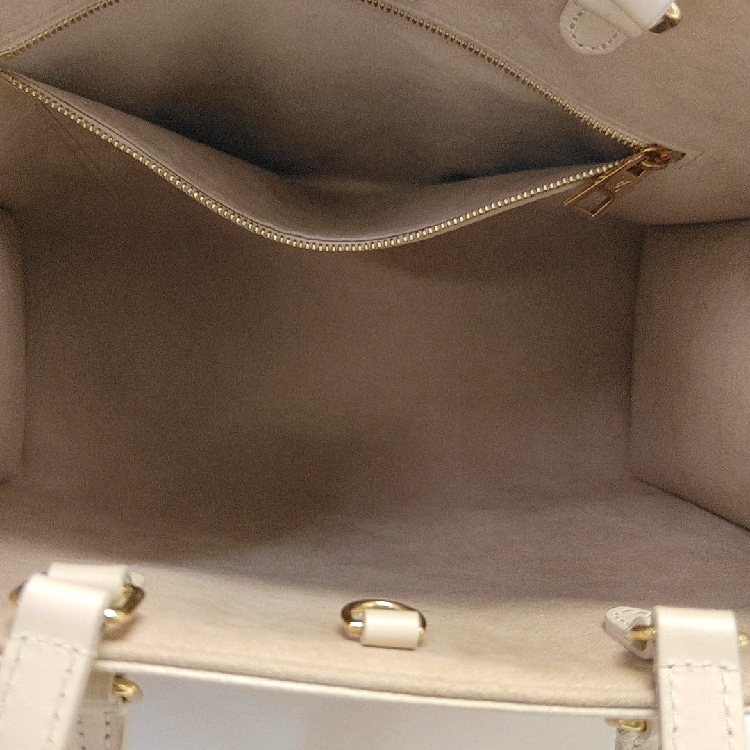 ONTHEGO MM Monogram Calfskin Beige
