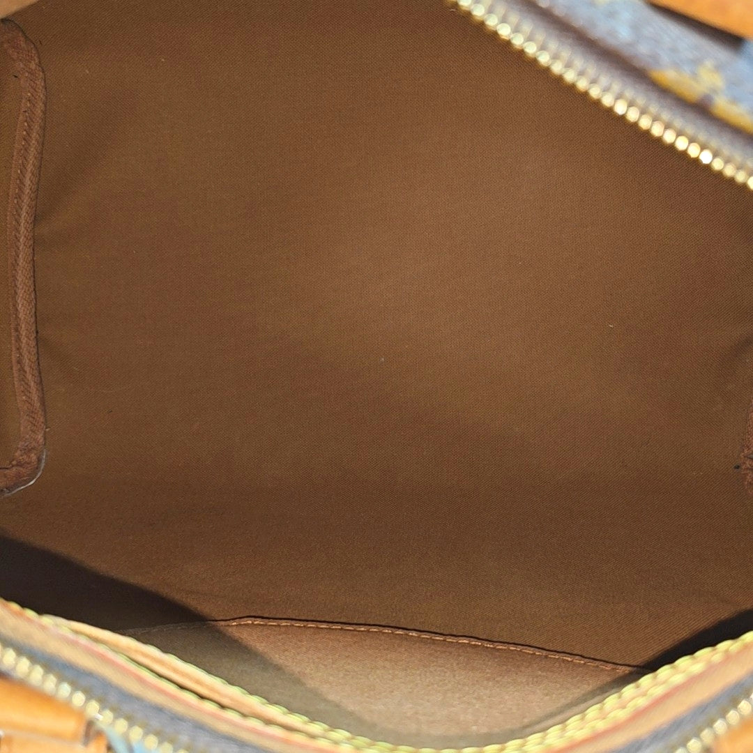 SPEEDY 30 Monogram Coated Canvas Brown