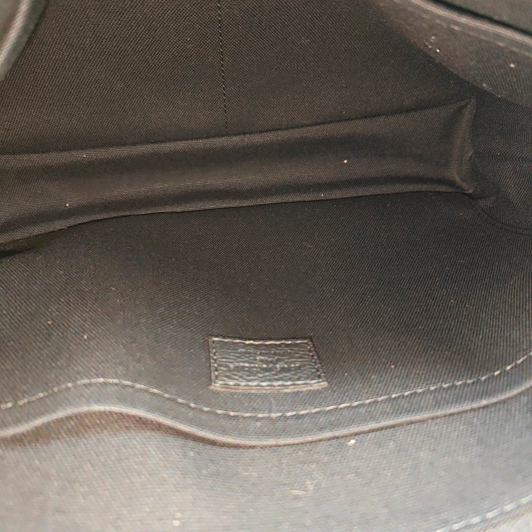 Pochette Voyag Monogram Coated Canvas Black