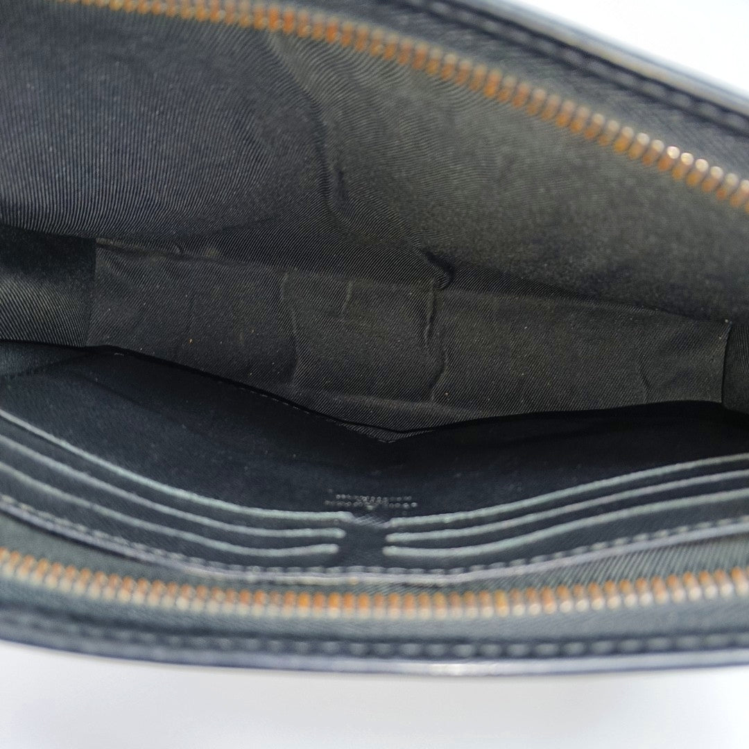 Pochette Voyag MM Monogram Coated Canvas Black