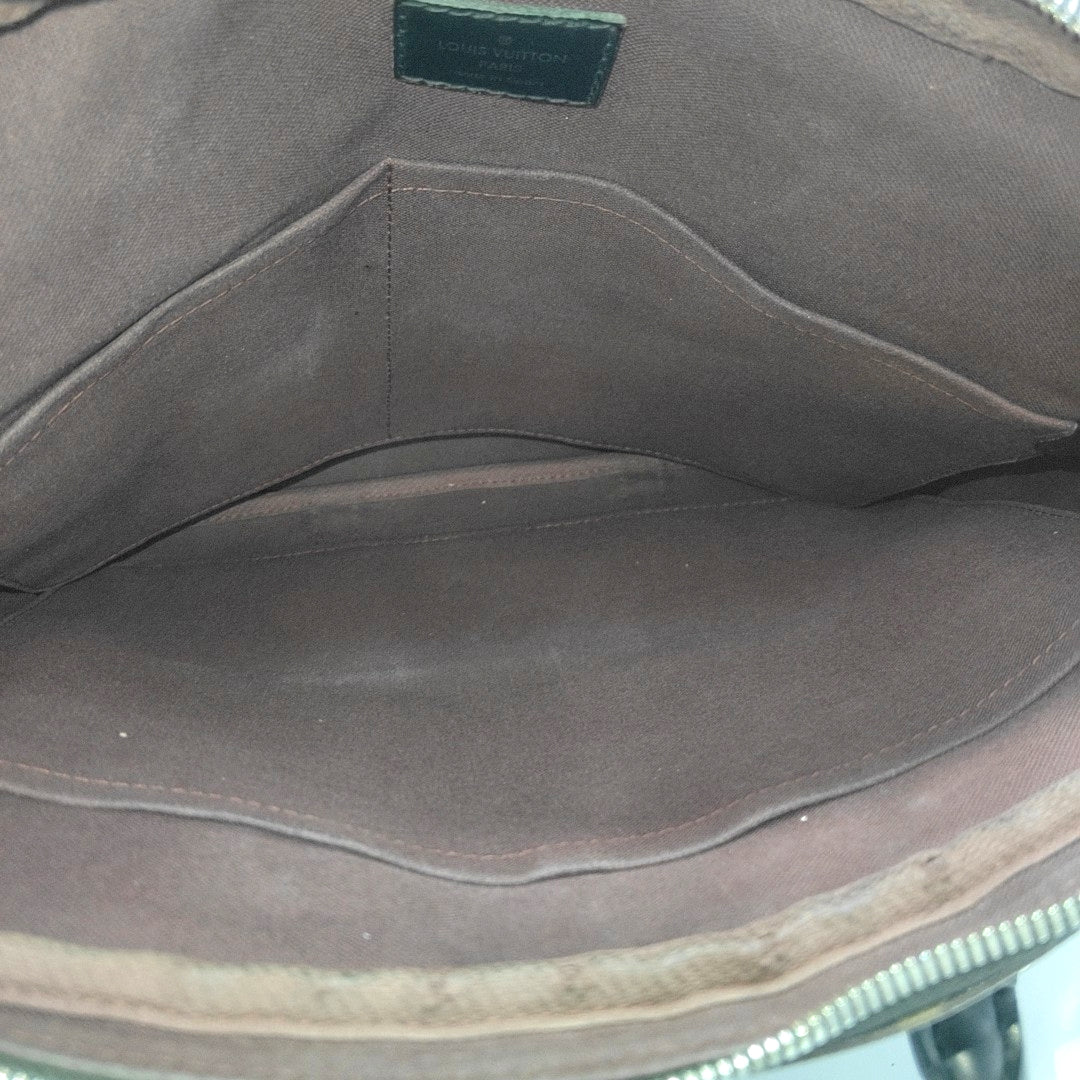 PORTE-DOCUMENTS PM Monogram Coated Canvas Brown