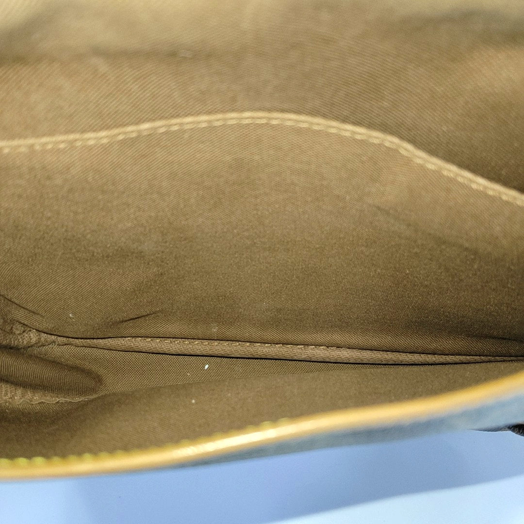 SAUMUR 30 Monogram Coated Canvas Brown