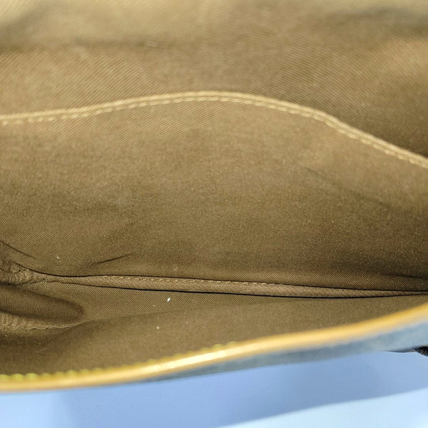 SAUMUR 30 Monogram Coated Canvas Brown