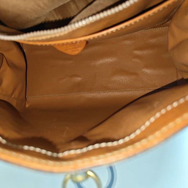 Authenticated pre-owned  MACADAM BLASON TRIOMPHE Coated Canvas Brown - Top Handle Bag at Looply