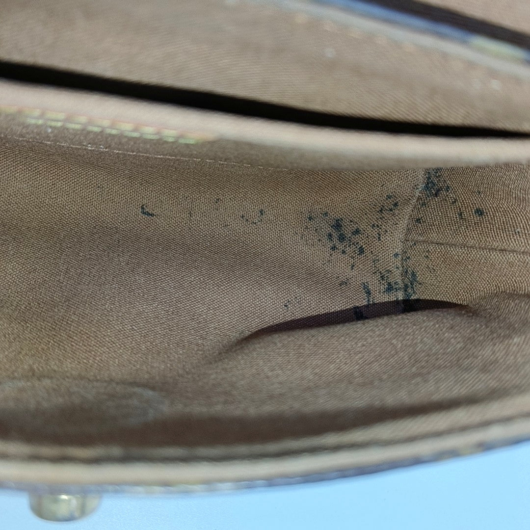 TIKAL Monogram Coated Canvas Brown