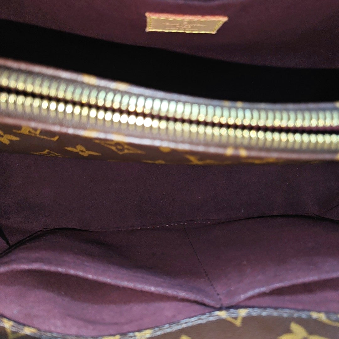 MONTAIGNE GM Monogram Coated Canvas Brown