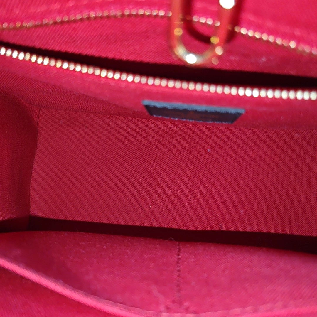 ONTHEGO PM Monogram Coated Canvas Brown