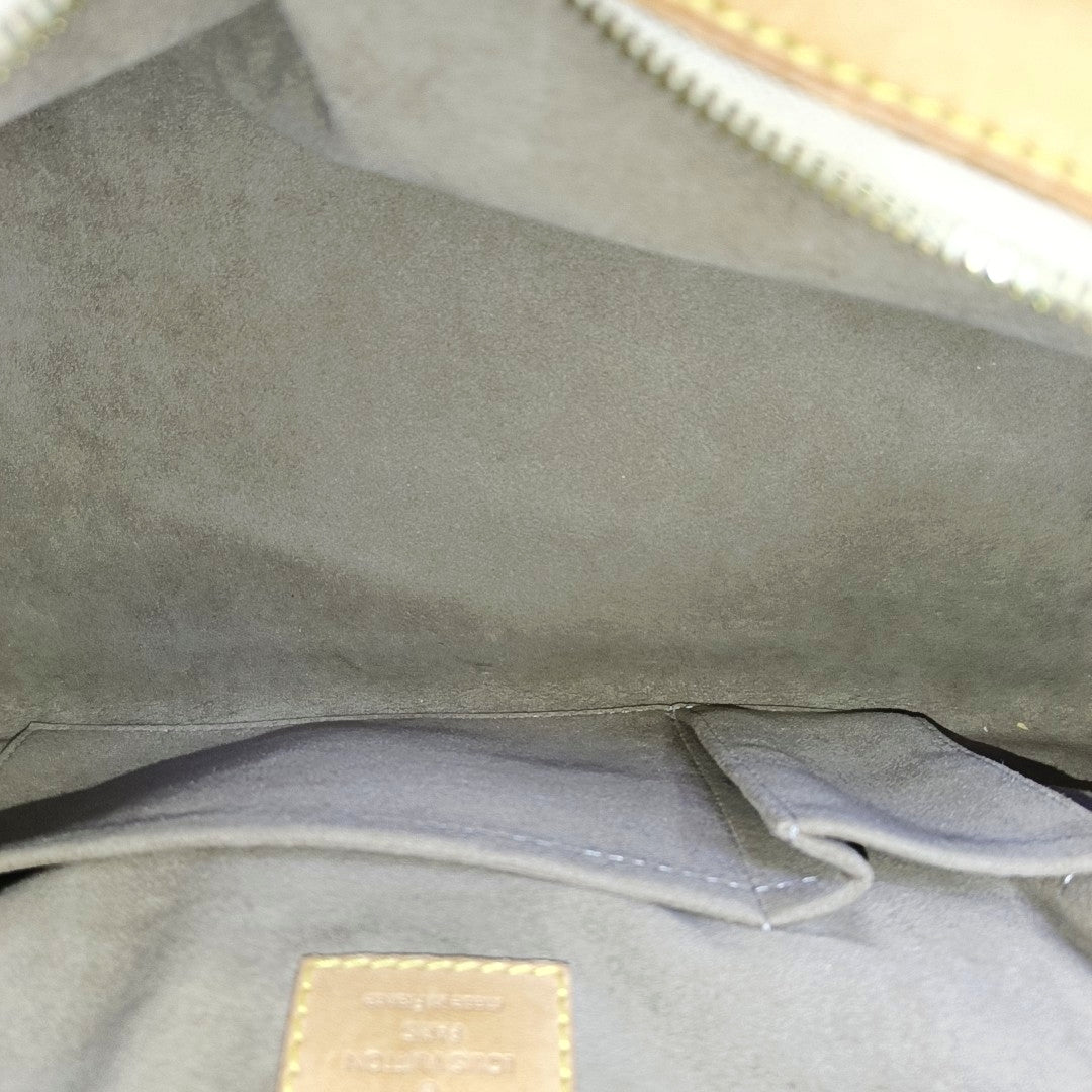 LV × TM CLAUDIA Monogram Coated Canvas Black