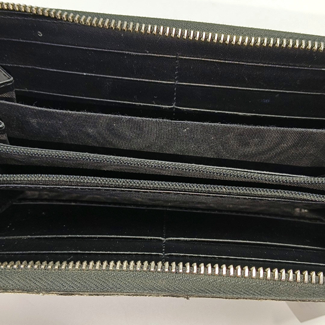 Monogram Coated Canvas Clutch Black