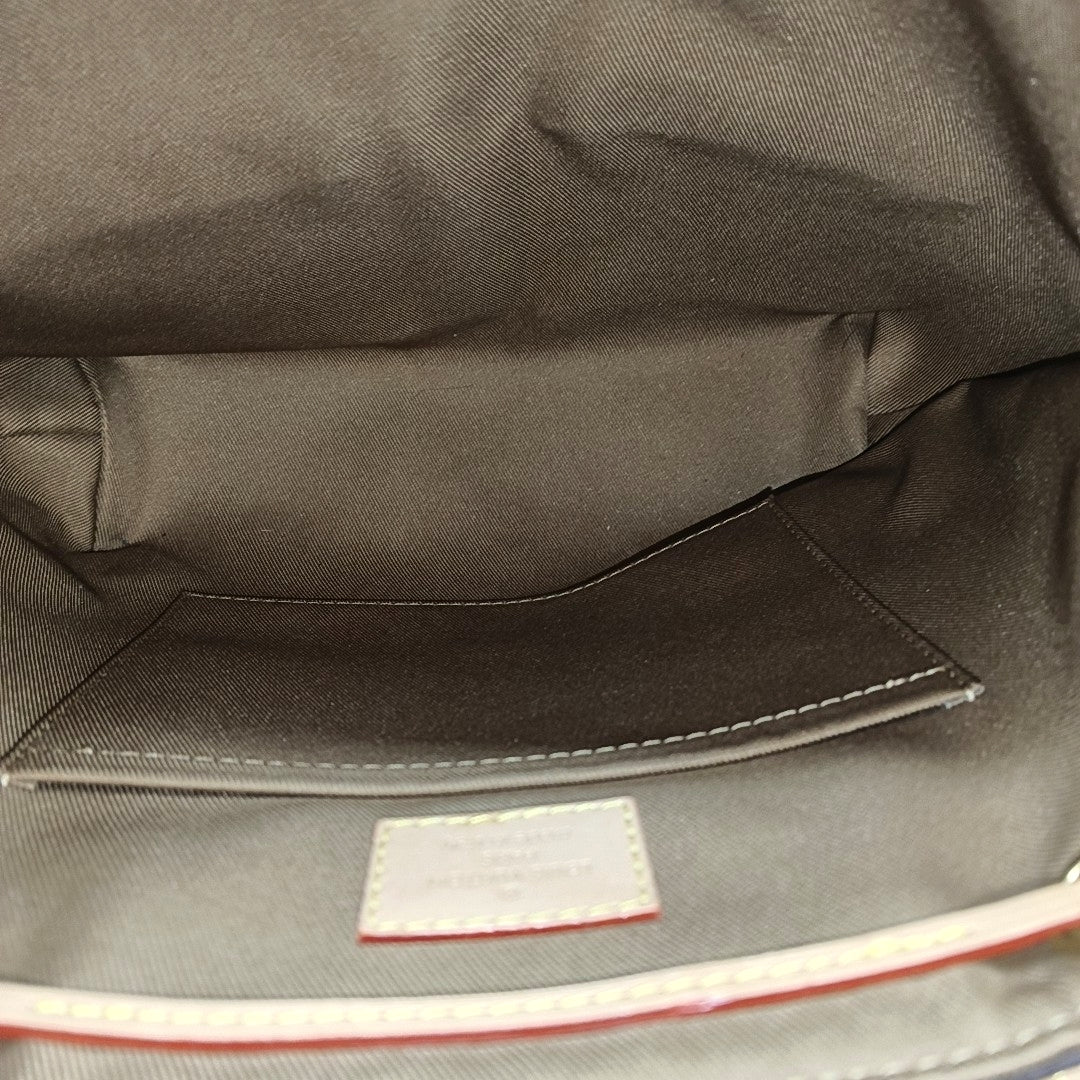 EXCURSION PM Monogram Coated Canvas Brown