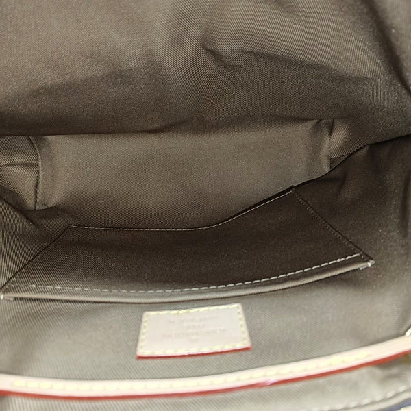 EXCURSION PM Monogram Coated Canvas Brown