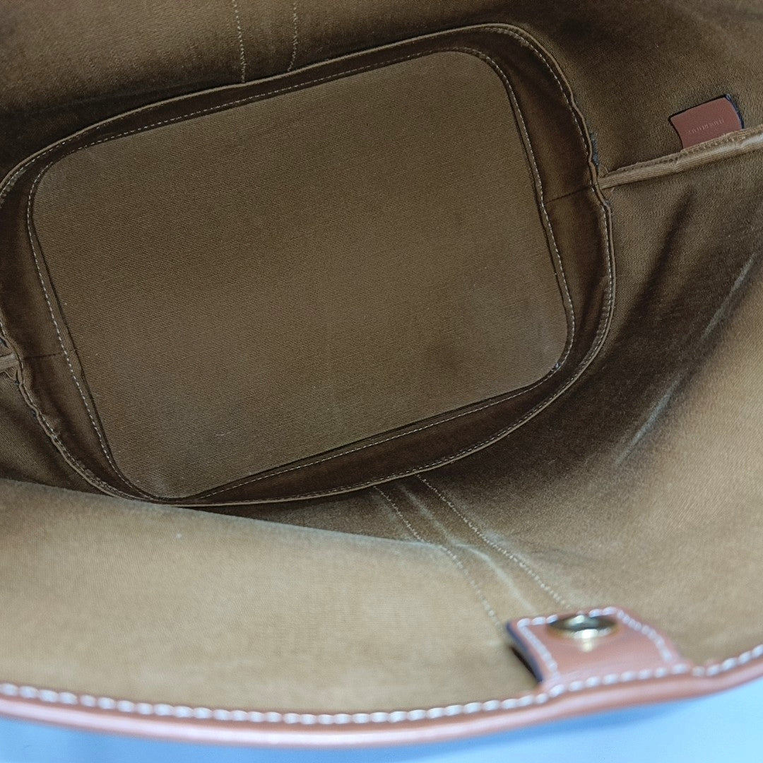 Authenticated pre-owned  TRIOMPHE CANVAS Medium Coated Canvas Brown - Bucket Bag at Looply