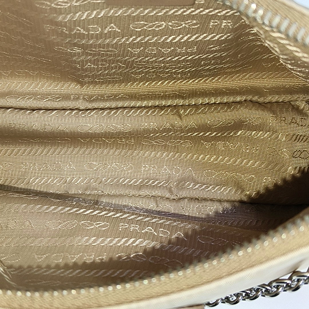 Authenticated pre-owned  Re-Edition2005 Nylon Beige - Shoulder Bag at Looply