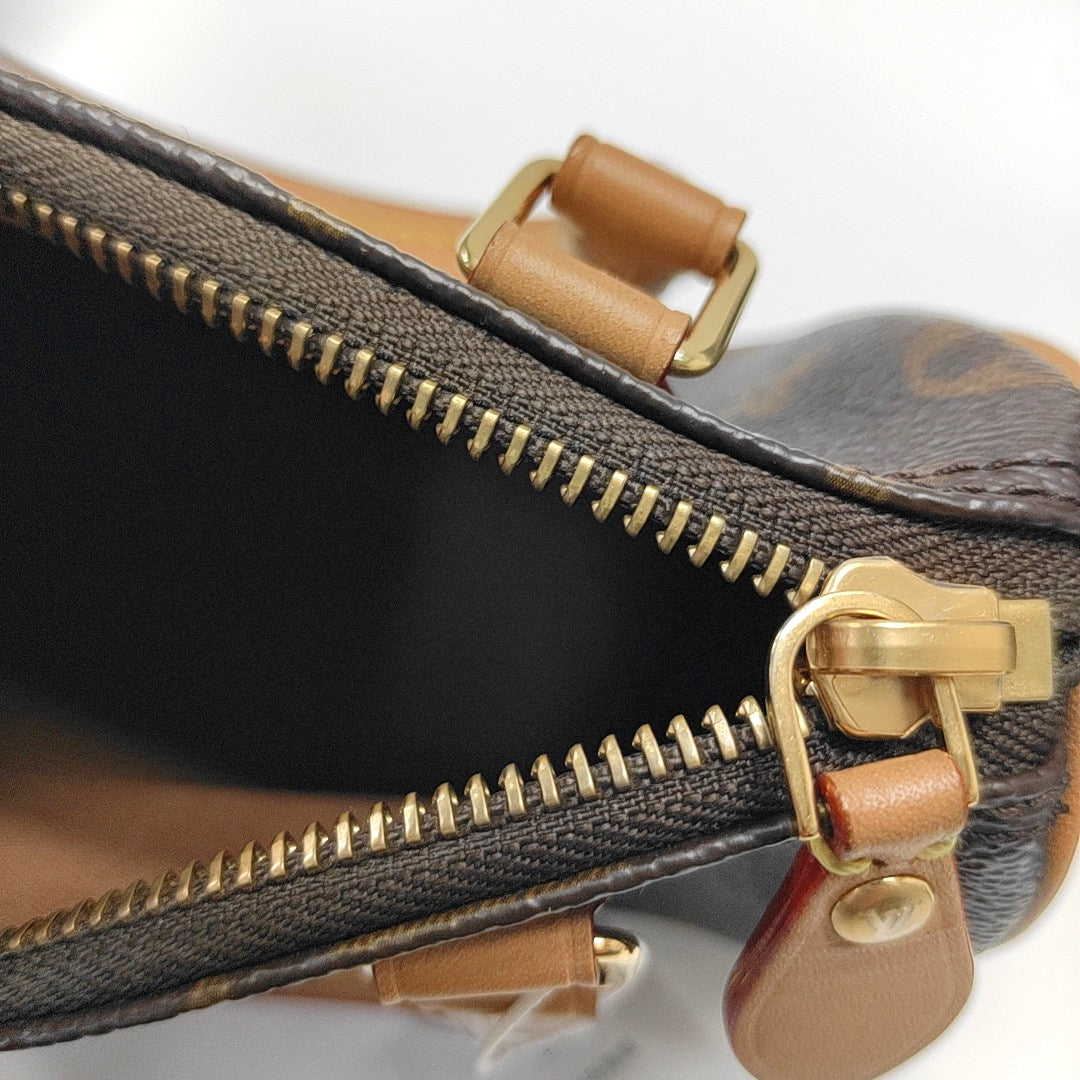 SPEEDY Nano Monogram Coated Canvas Brown