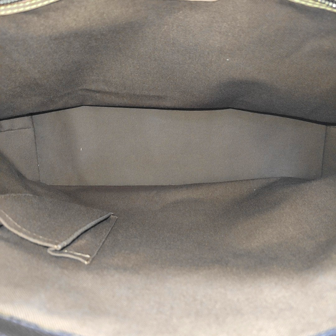 PIANO Monogram Coated Canvas Brown