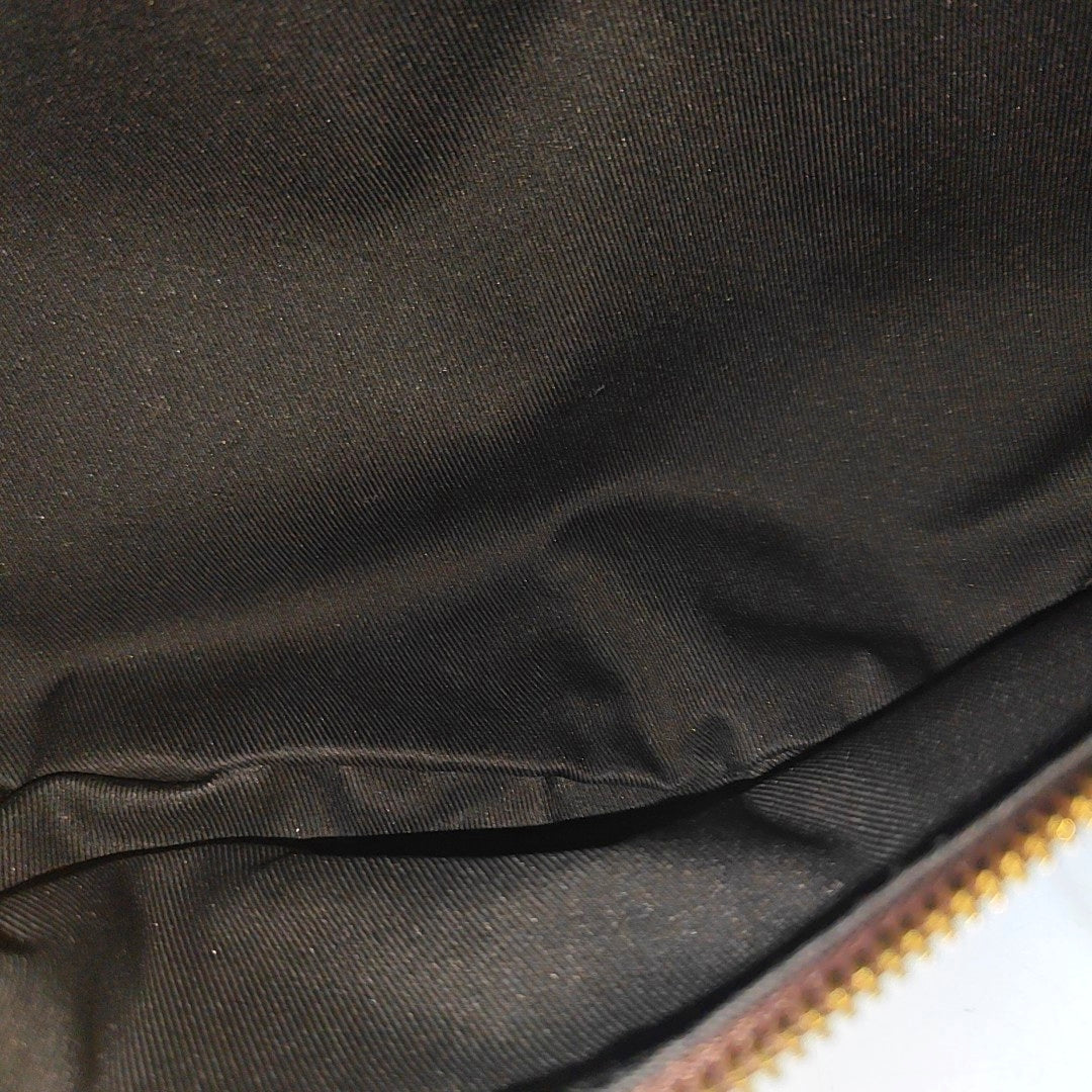 BUMBAG Monogram Coated Canvas Brown