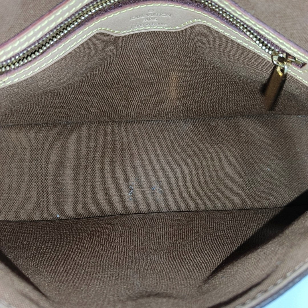 LOOPING PM Monogram Coated Canvas Brown