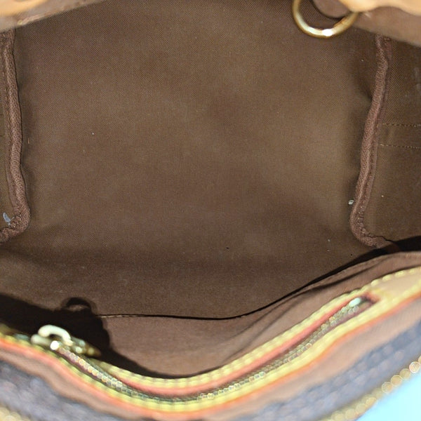 SPEEDY 25 Monogram Coated Canvas Brown