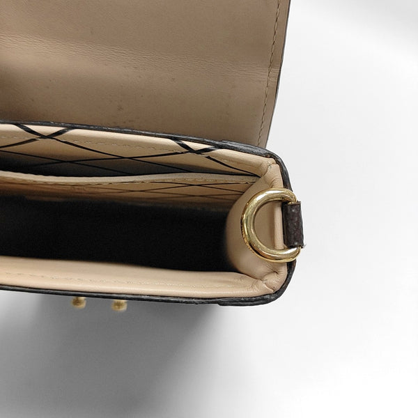 TRUNK Monogram Coated Canvas Brown