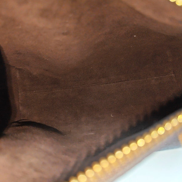 SIDE TRUNK PM Monogram Coated Canvas Brown