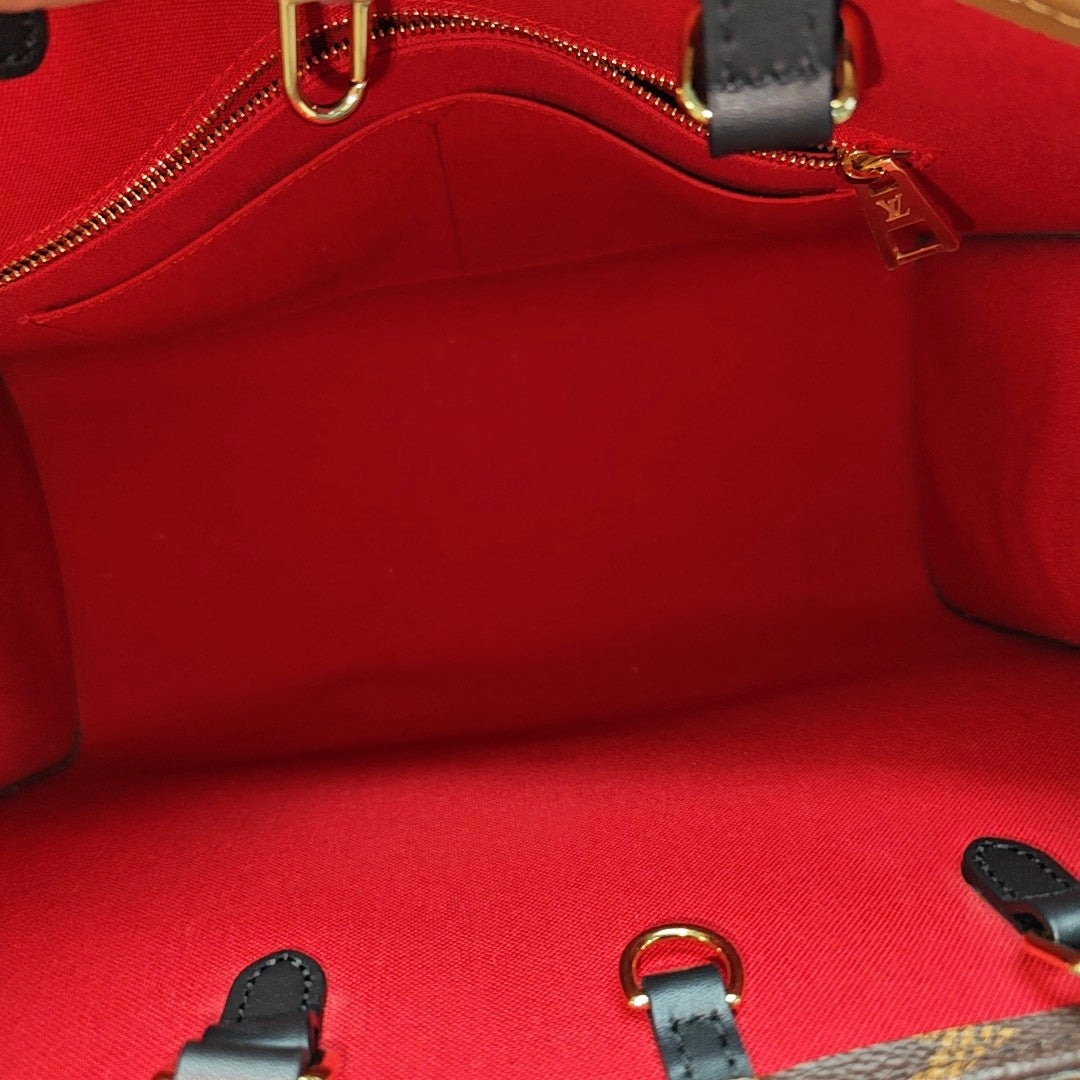 ONTHEGO MM Monogram Coated Canvas Brown