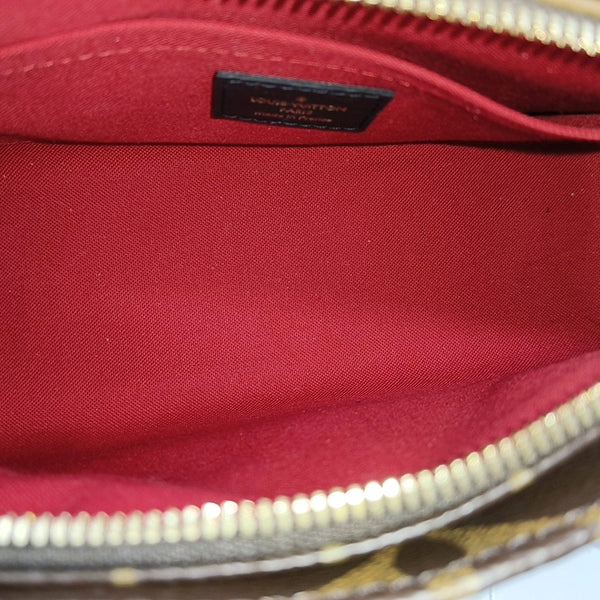 ONTHEGO EAST WEST Chain Monogram Coated Canvas Brown